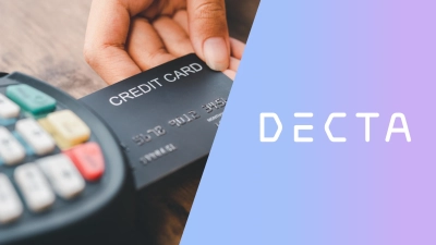A customer making a mobile payment on a card reader illustrating digital payment processing fees and contactless transaction costs.